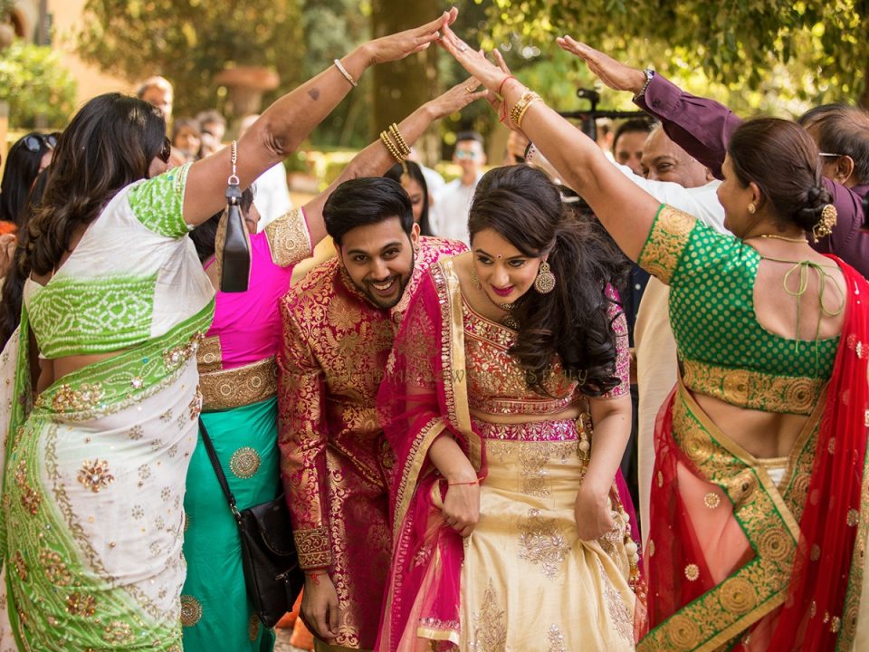 indian bride and groom making their entrance at sangeet event in italy 960x720 - Portfolio