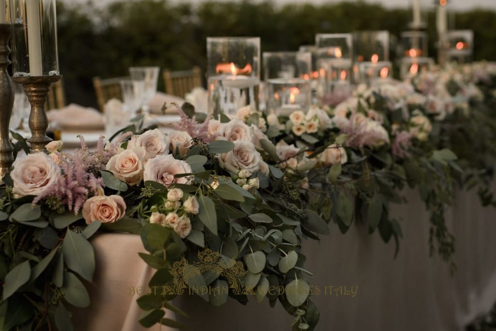 floral garland for the top table during wedding reception in the castle in italy 1024x683 - Luxury Indian wedding on the lake in Italy