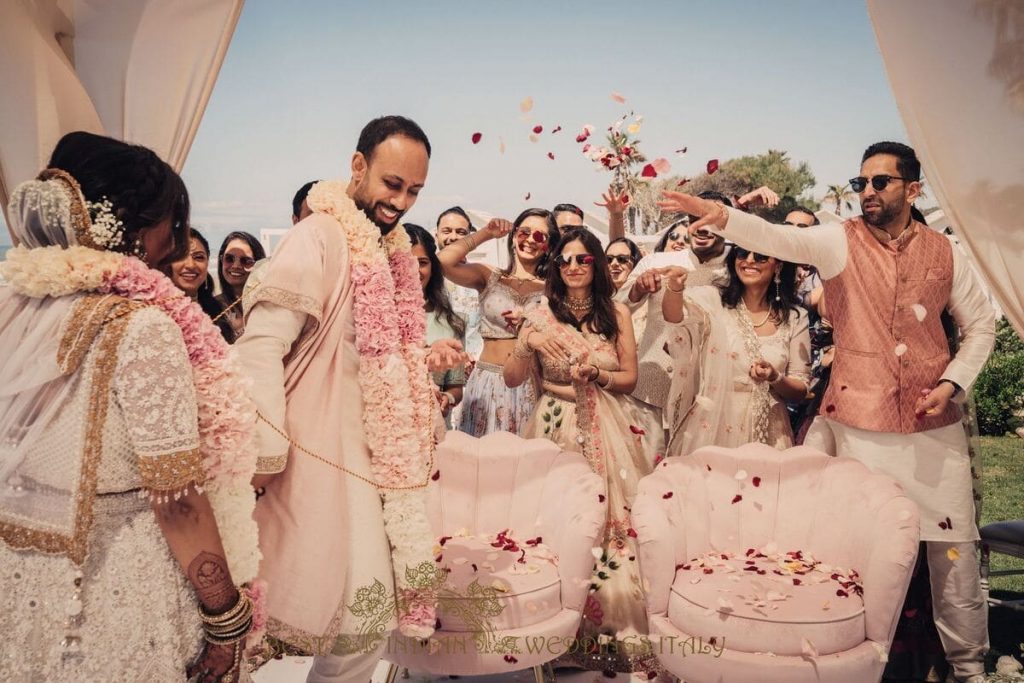 flowers toss at indian wedding in italy 1024x683 - Beautiful seaside Indian wedding in Southern Italy