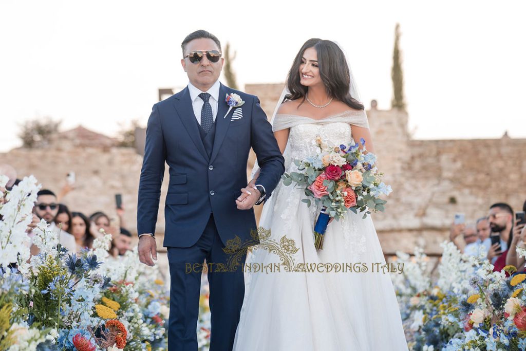 bride entrance wedding ceremony 1024x683 - Fairy tale symbolic wedding in an Italian castle overlooking the sea