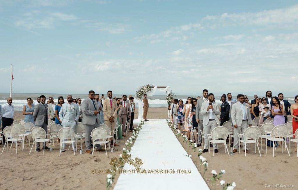 white dress ceremony on the beach in italy 1024x653 - 4-days Indian beach wedding celebrations in Italy