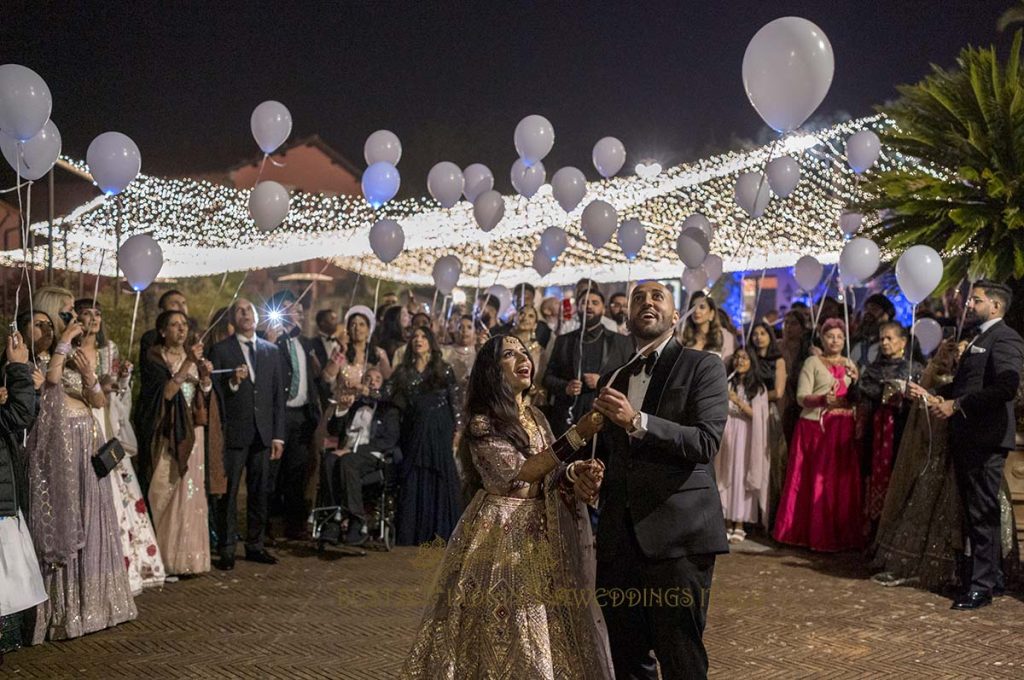 led balloons release indian wedding italy 1024x680 - Elegant Sikh wedding ceremony in the countryside of Italy