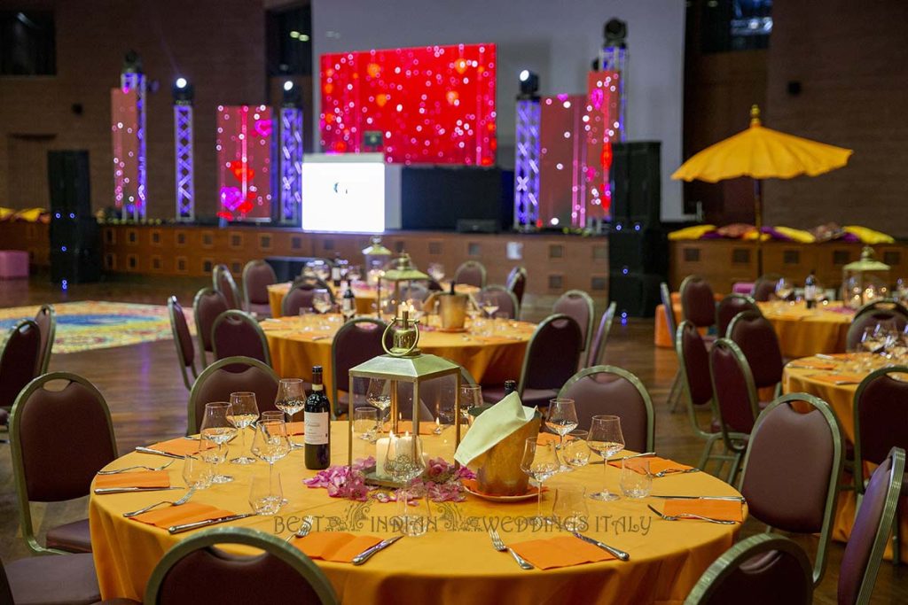 orange tablecloth indian theme wedding 1024x683 - Sikh pre-wedding events in Italy with a wow-factor