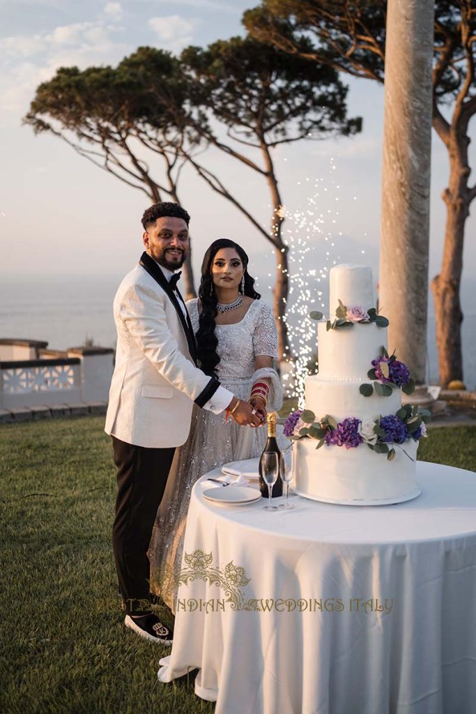 cake cutting indian wedding italy 683x1024 - Traditional Sikh wedding in a breathtaking seaview Villa in Italy