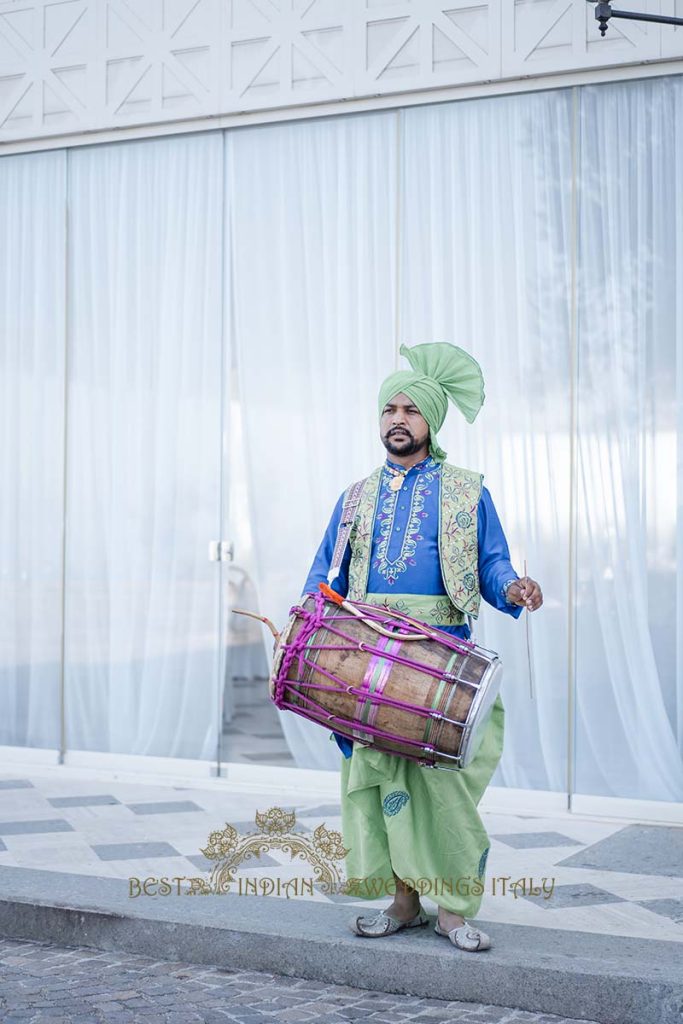 dhol player italy 683x1024 - Traditional Sikh wedding in a breathtaking seaview Villa in Italy