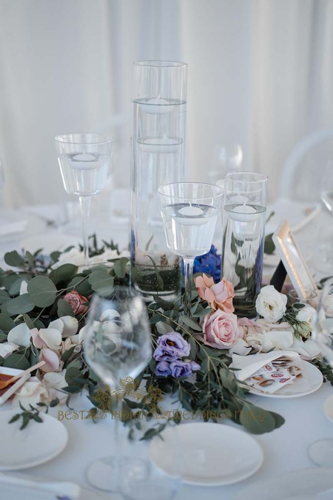 floral table arrangement italy 683x1024 - Traditional Sikh wedding in a breathtaking seaview Villa in Italy