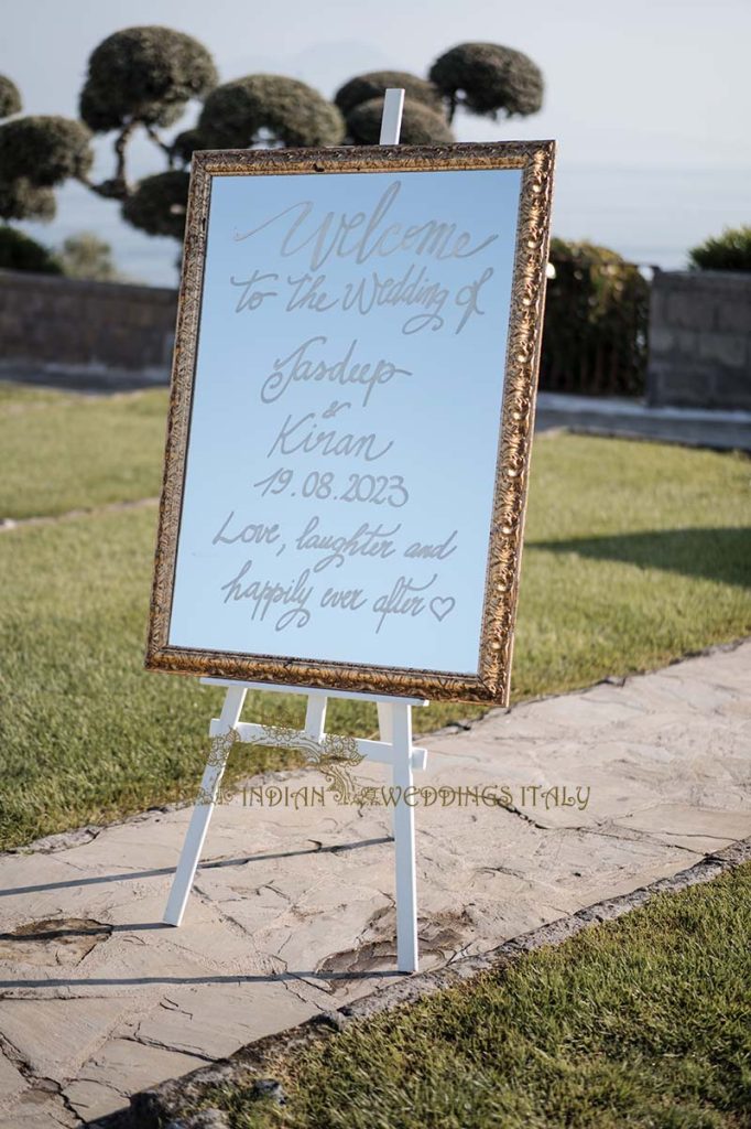 mirror welcome sign italy 682x1024 - Traditional Sikh wedding in a breathtaking seaview Villa in Italy