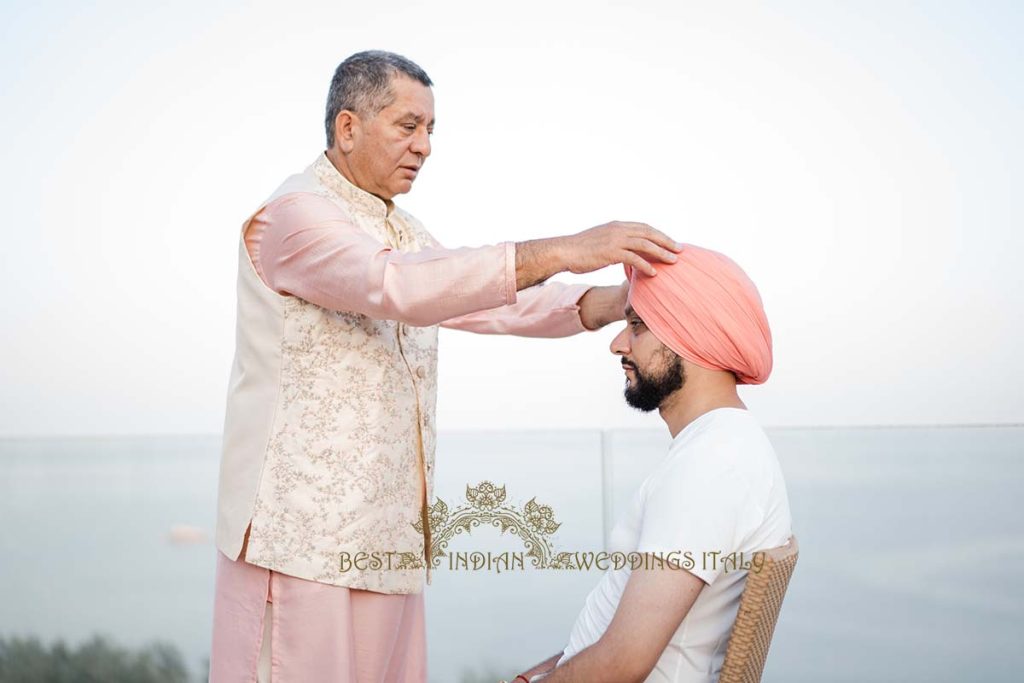 sikh turban tying italy 1024x683 - Traditional Sikh wedding in a breathtaking seaview Villa in Italy